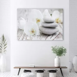Feeby Obraz na płótnie Biała orchidea i kamienie 60x40