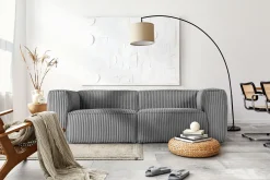 KONSIMO FEROX Nowoczesna sofa trzyosobowa w tkaninie sztruksowej