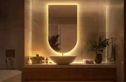 Nieregularne lustro półowalne 50 x 90 cm LED do łazienki - ciepłe światło