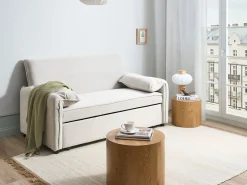 Sofa tapicerowana rozkładana dwuosobowa z funkcją spania złamana biel
