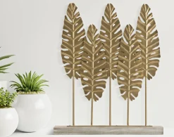 Złota metalowa rzeźba na podstawie 47x10x57,5 cm